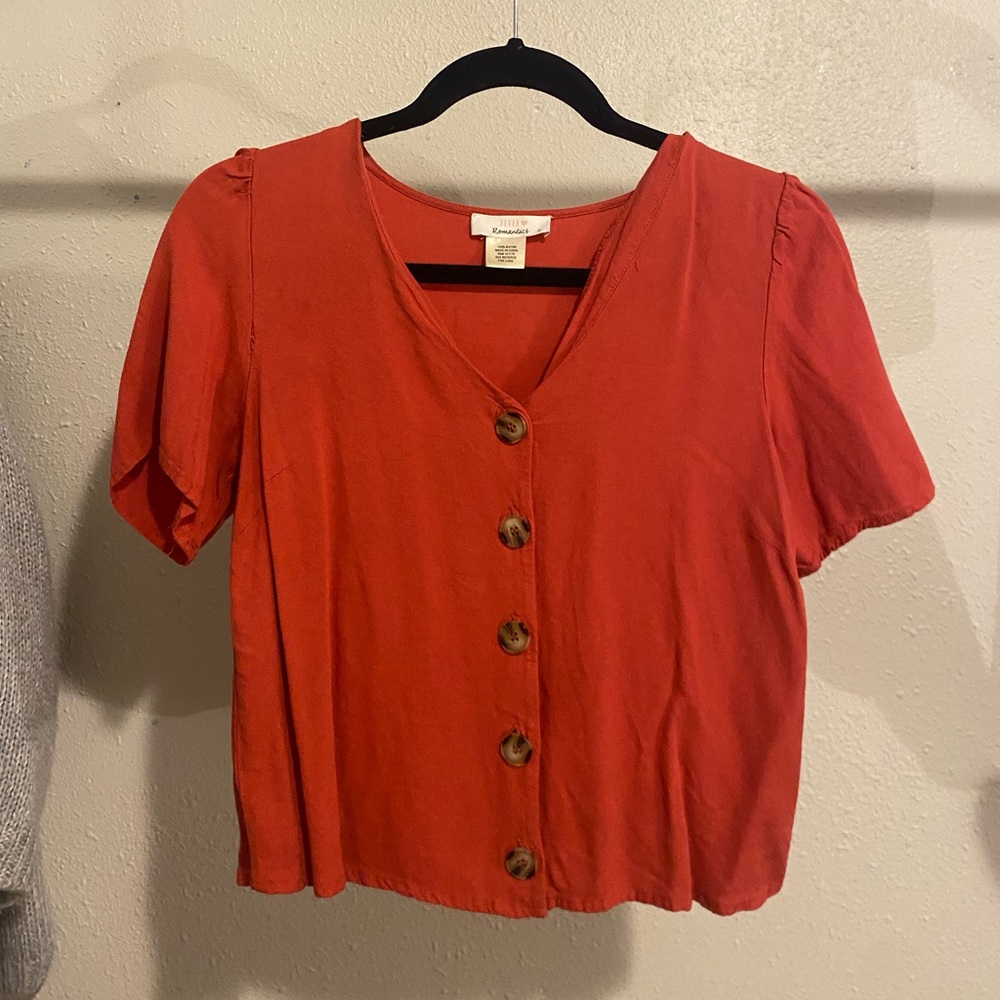 Red button up blouse